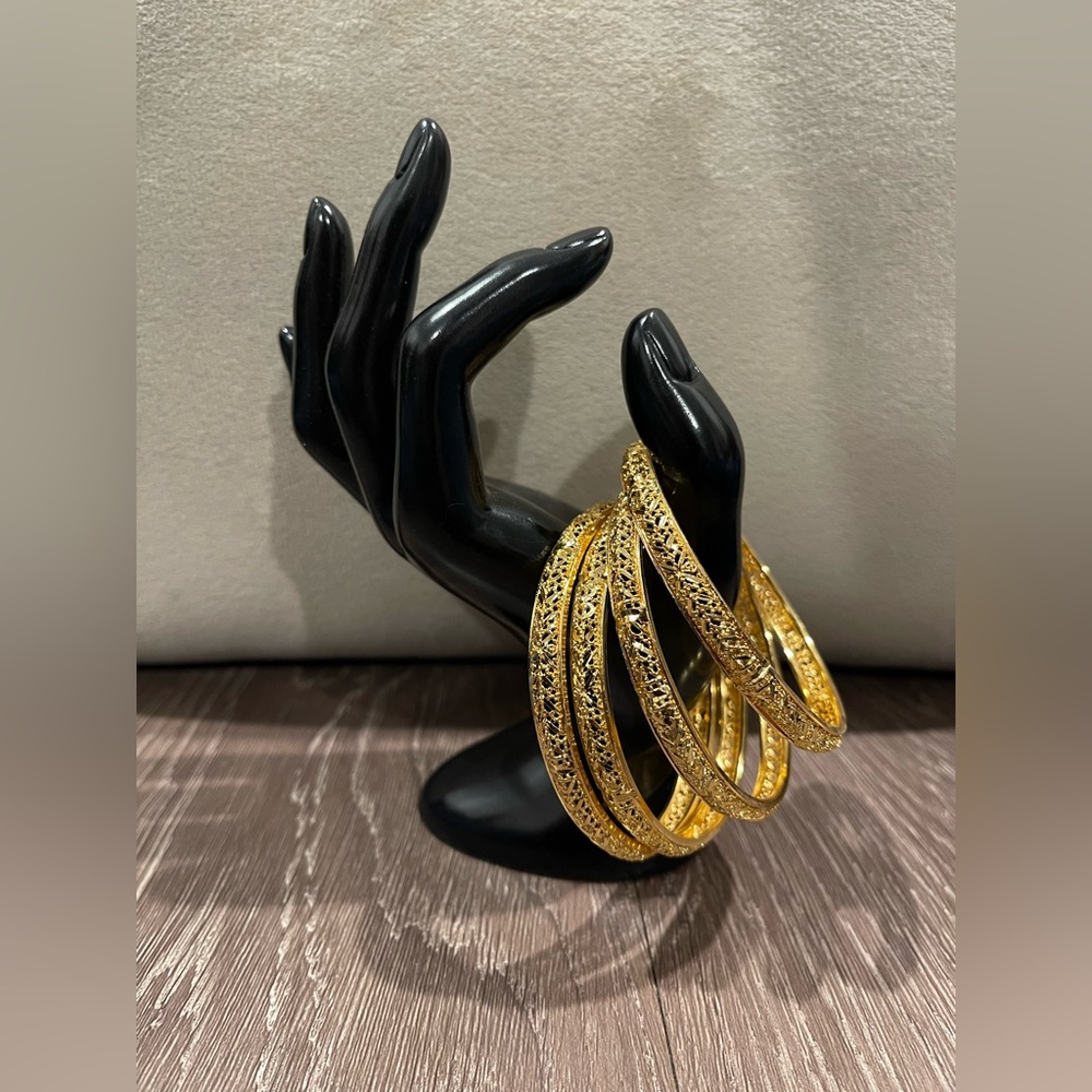 Set of 4 Gold-Tone Textured Bangle Bracelets – Sparkle & Filigree Design